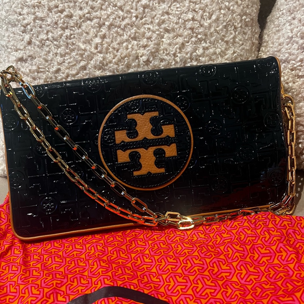 Tory Burch foldover bag.